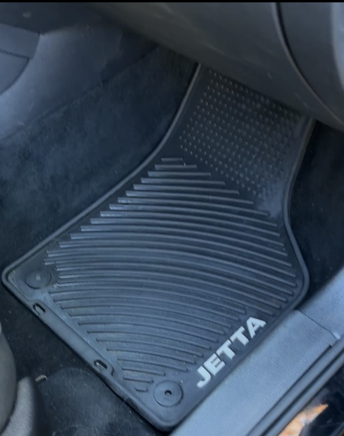 Same Jetta floor mat after detailing